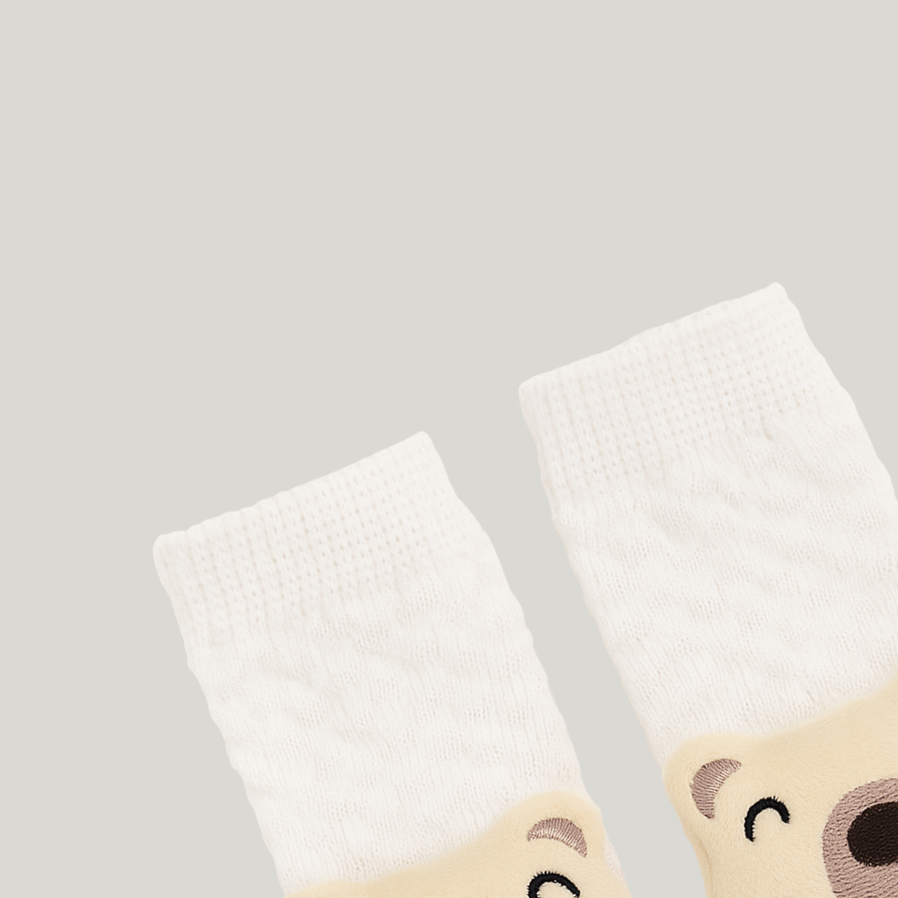 Meia bebê Teddy Sensorial