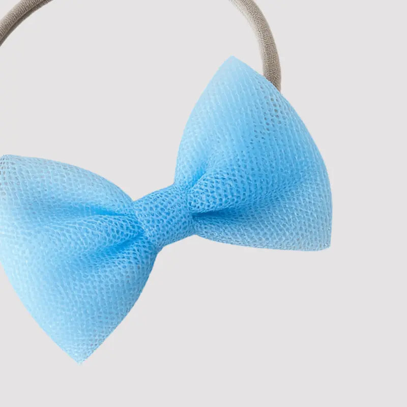 acessório de cabelo com laço delicado azul claro