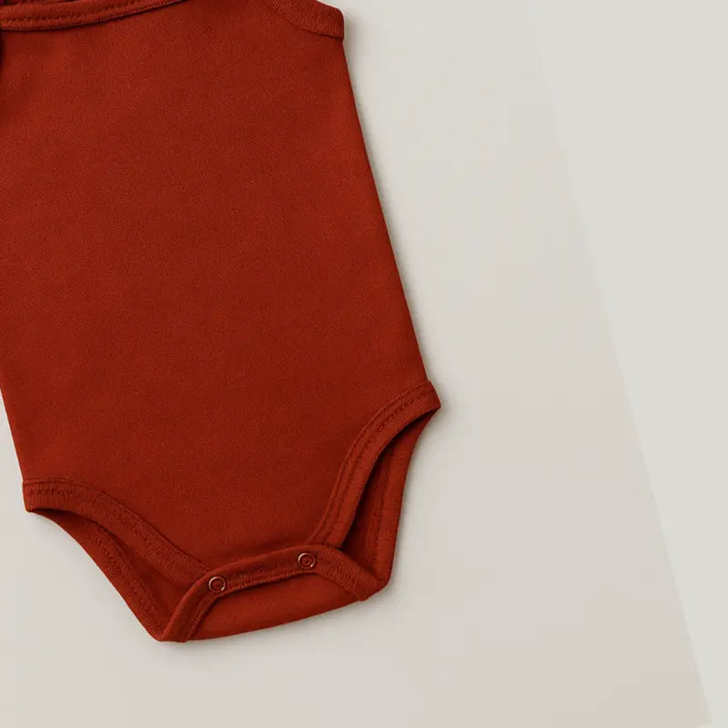 body regata bebê menina em tom ocre para dias quentes