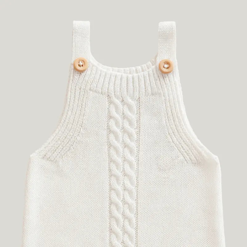 jardineira bebê unissex em tricot macio e confortável