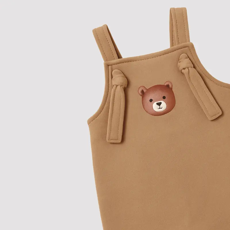 jardineira marrom bebê moletom com bolso e detalhe fofo