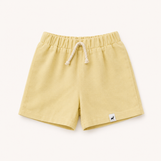Pantalones cortos de playa amarillos de lino para bebé