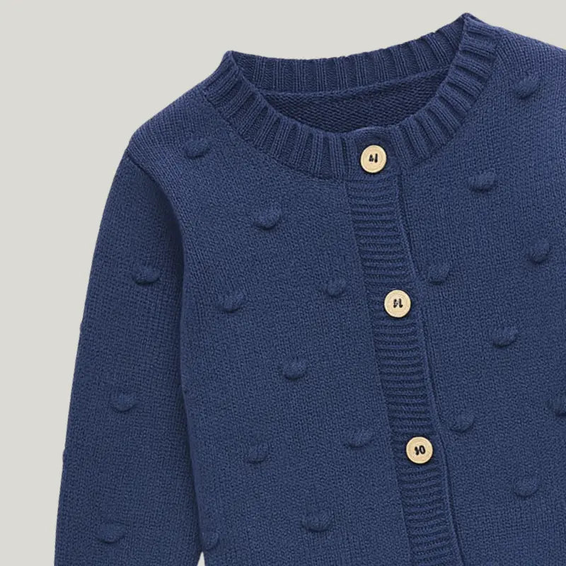 cardigan infantil em tricot azul escuro com botões

