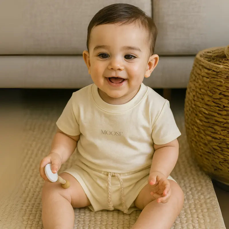 conjunto bebê confort moose off white camisa curta e short