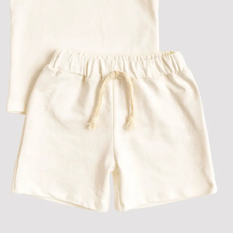 conjunto bebê off white unissex leve e moderno