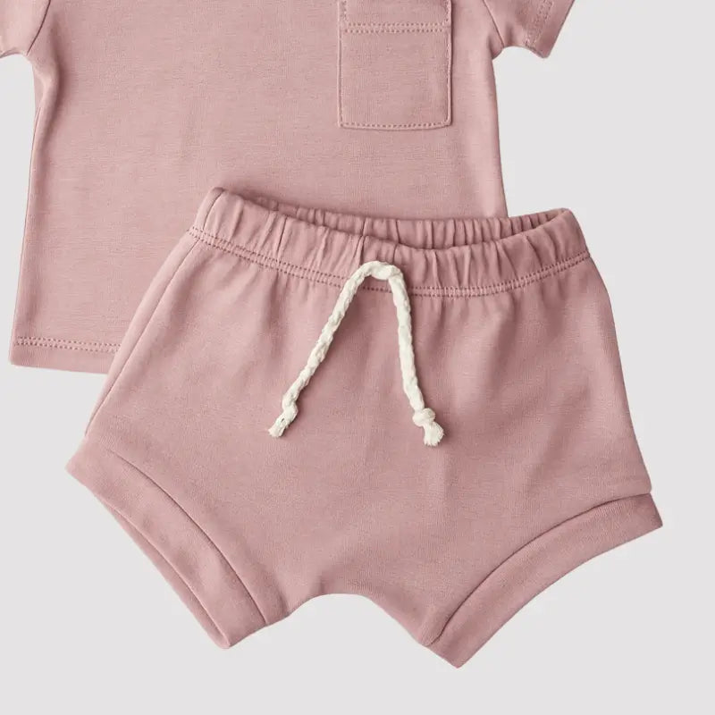 conjunto rosa bebê com blusa e short

