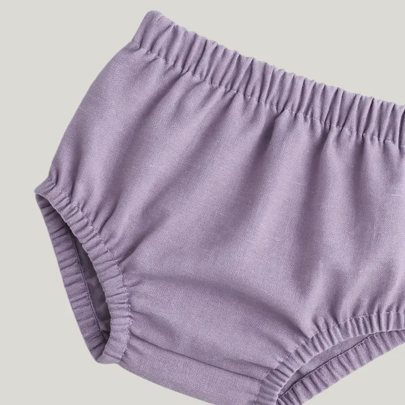 roupa delicada de linho lavanda para bebê

