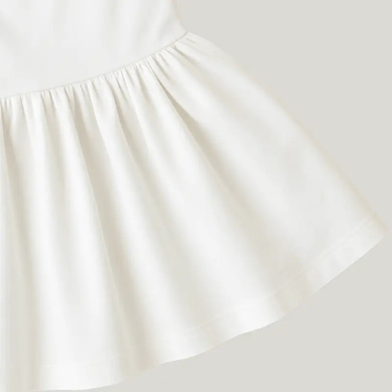roupa sofisticada para bebê menina com vestido off white

