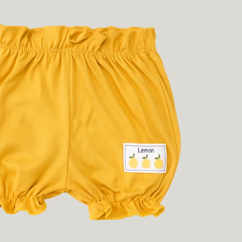 short bebê mostarda unissex em algodão